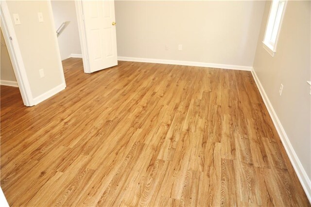 unfurnished bedroom with light hardwood / wood-style flooring