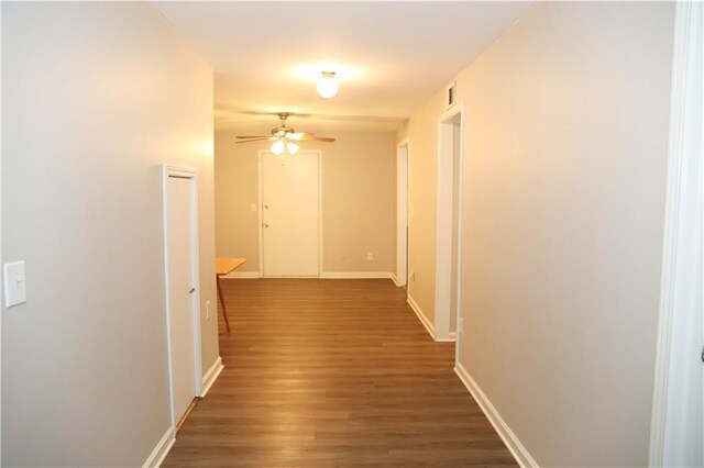 hallway featuring hardwood / wood-style floors