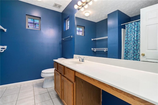 139 W Oaks Pl, Woodstock, GA 30188 - bathroom featuring a textured ceiling, vanity, tile patterned flooring, and curtained shower