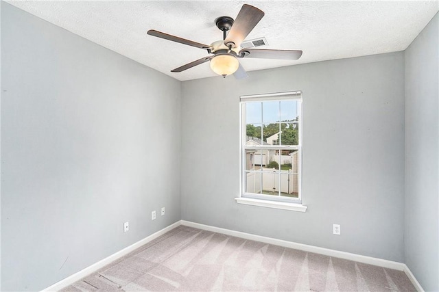 139 W Oaks Pl, Woodstock, GA 30188 - spare room with ceiling fan, light carpet, and a textured ceiling