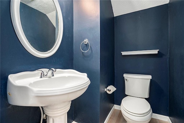 139 W Oaks Pl, Woodstock, GA 30188 - half bathroom with toilet and wood finished floors
