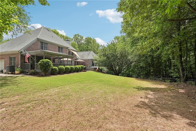 3235 Munsey Ct, Cumming, GA 30041 - view of green lawn with a garage
