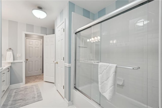 3235 Munsey Ct, Cumming, GA 30041 - bathroom featuring vanity and shower / bath combination with glass door