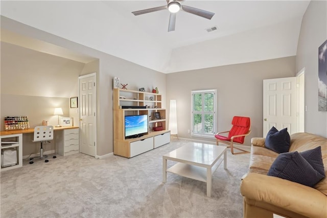 3235 Munsey Ct, Cumming, GA 30041 - carpeted living room featuring vaulted ceiling, a desk, and a ceiling fan