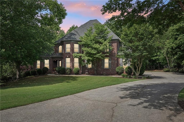 3235 Munsey Ct, Cumming, GA 30041 - view of front of house with a front lawn, driveway, and brick siding