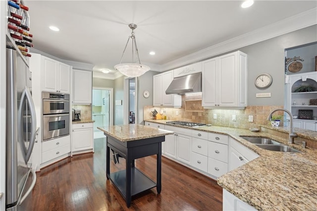 3235 Munsey Ct, Cumming, GA 30041 - kitchen with stainless steel appliances, crown molding, ventilation hood, backsplash, and white cabinetry