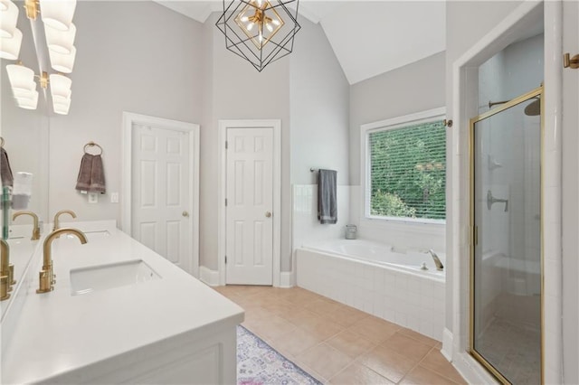 3235 Munsey Ct, Cumming, GA 30041 - full bathroom featuring a chandelier, a bath, a stall shower, double vanity, and tile patterned flooring