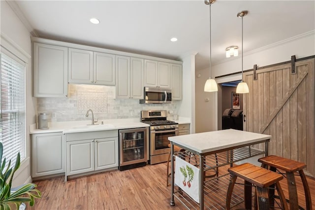 3235 Munsey Ct, Cumming, GA 30041 - kitchen with appliances with stainless steel finishes, wine cooler, tasteful backsplash, ornamental molding, and light countertops