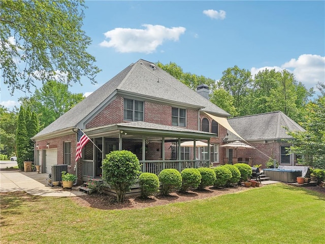 3235 Munsey Ct, Cumming, GA 30041 - back of property with brick siding, a hot tub, concrete driveway, a garage, and a lawn