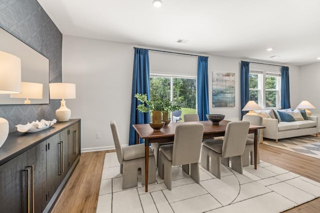 dining room featuring light hardwood / wood-style flooring