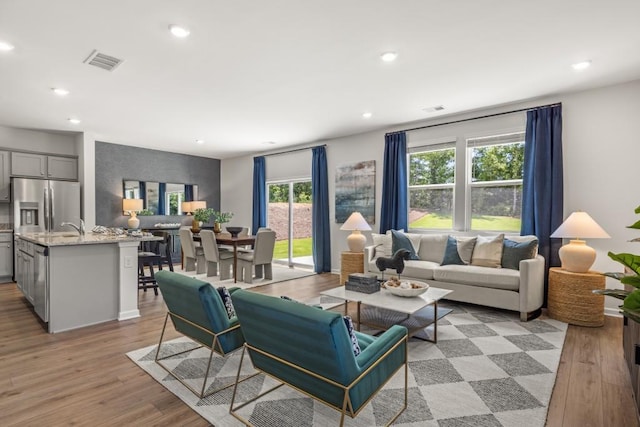 living room featuring light hardwood / wood-style floors