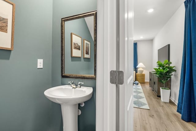 bathroom featuring hardwood / wood-style flooring