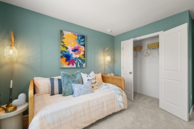 carpeted bedroom with a closet