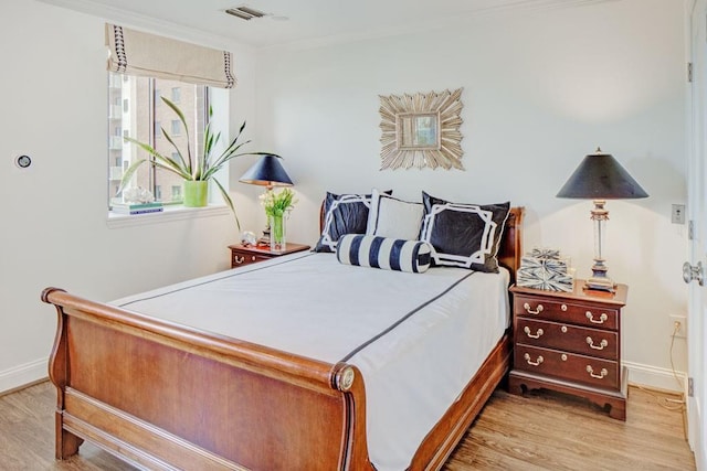 300 Johnson Ferry Rd NE Unit A706, Atlanta, GA 30328 - bedroom featuring wood finished floors, baseboards, and ornamental molding