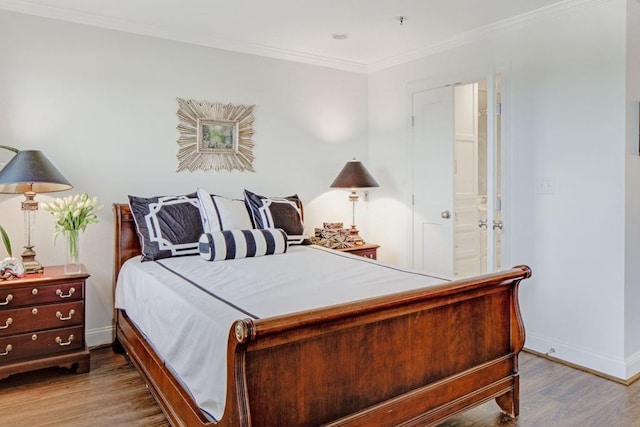 300 Johnson Ferry Rd NE Unit A706, Atlanta, GA 30328 - bedroom featuring wood finished floors, baseboards, and ornamental molding