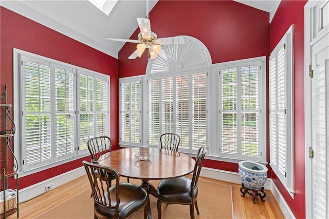 2117 Stephens Walk, Dunwoody, GA 30338 - dining area featuring wood finished floors, lofted ceiling, ceiling fan, and healthy amount of natural light