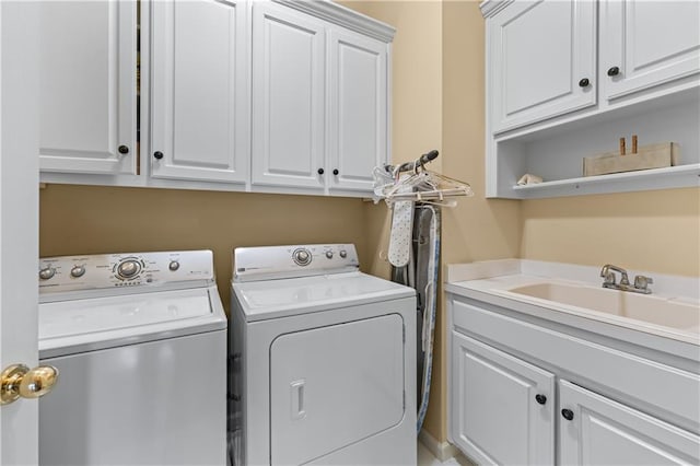 2117 Stephens Walk, Dunwoody, GA 30338 - laundry area featuring cabinet space and separate washer and dryer