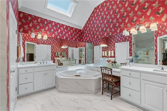 2117 Stephens Walk, Dunwoody, GA 30338 - full bathroom featuring wallpapered walls, crown molding, a garden tub, a skylight, and two vanities