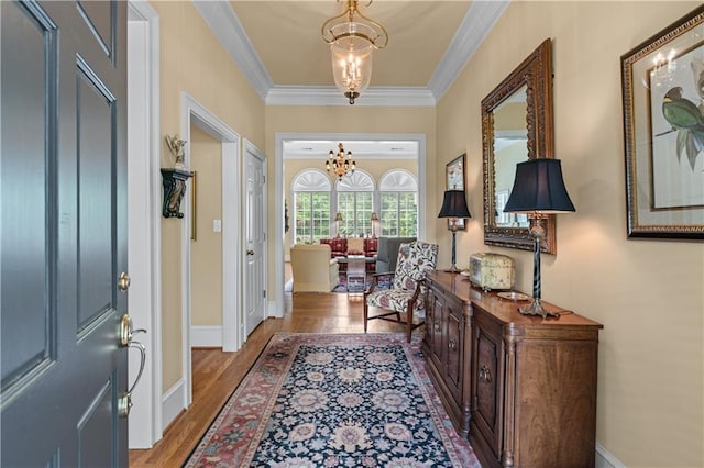 2117 Stephens Walk, Dunwoody, GA 30338 - entrance foyer featuring a chandelier, wood finished floors, crown molding, and baseboards
