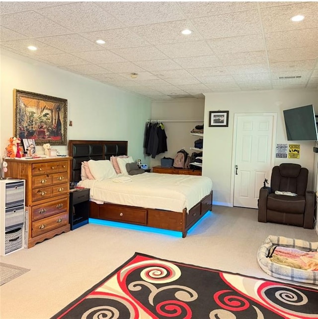bedroom featuring carpet flooring and recessed lighting