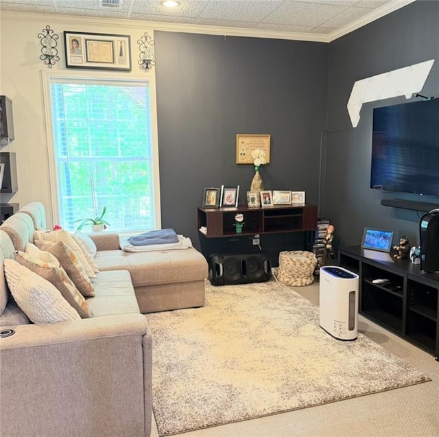 living room with carpet floors and ornamental molding