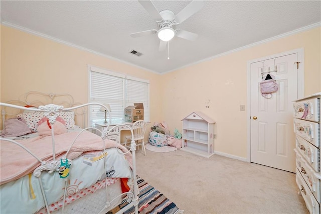 bedroom featuring ornamental molding, light colored carpet, a textured ceiling, ceiling fan, and baseboards