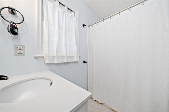 full bath with a sink