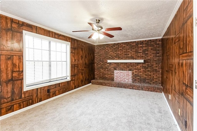 unfurnished room featuring carpet and a textured ceiling