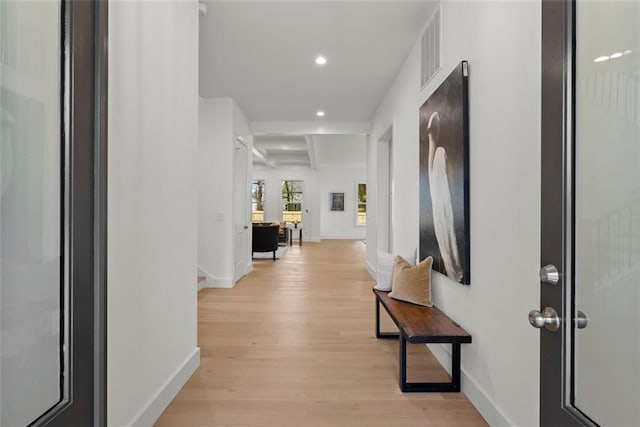 corridor featuring baseboards, visible vents, recessed lighting, and light wood-type flooring