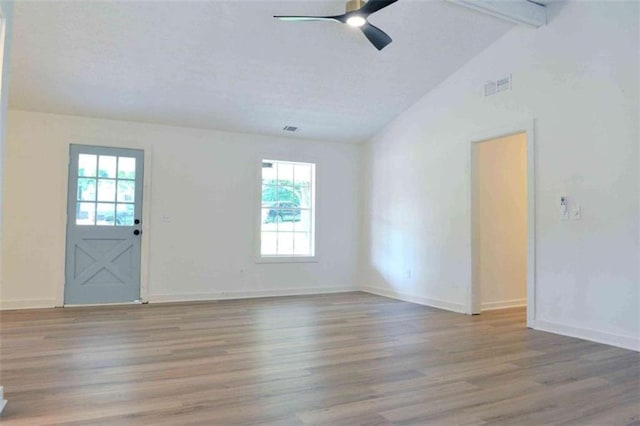 5974 SW Four Winds Dr SW, Lilburn, GA 30047 - unfurnished room featuring plenty of natural light, wood finished floors, and a ceiling fan