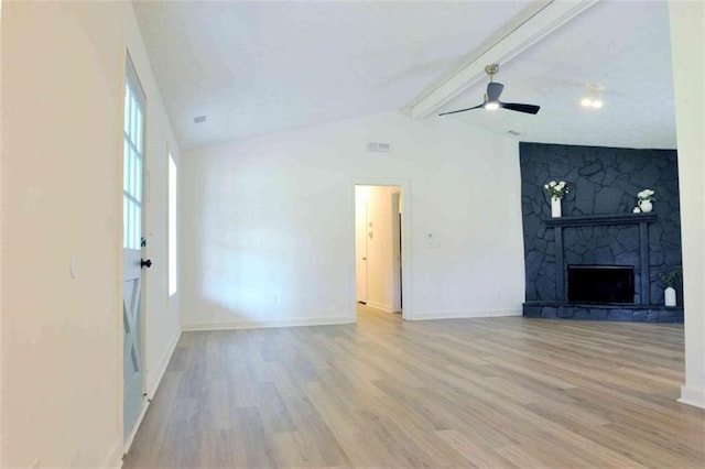 5974 SW Four Winds Dr SW, Lilburn, GA 30047 - unfurnished living room featuring wood finished floors, a stone fireplace, and ceiling fan