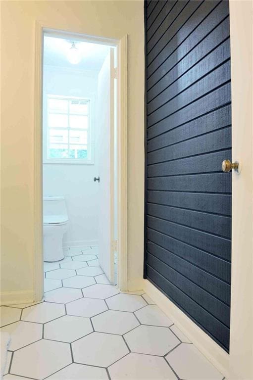 5974 SW Four Winds Dr SW, Lilburn, GA 30047 - bathroom featuring toilet and tile patterned floors