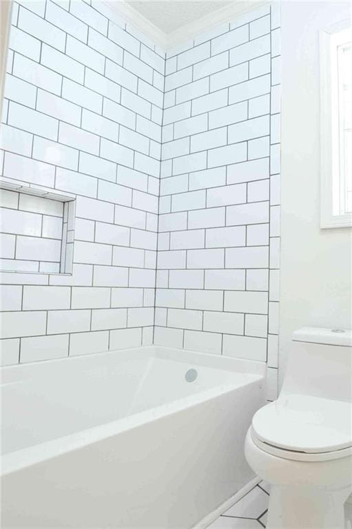 5974 SW Four Winds Dr SW, Lilburn, GA 30047 - bathroom featuring shower / bath combination and crown molding