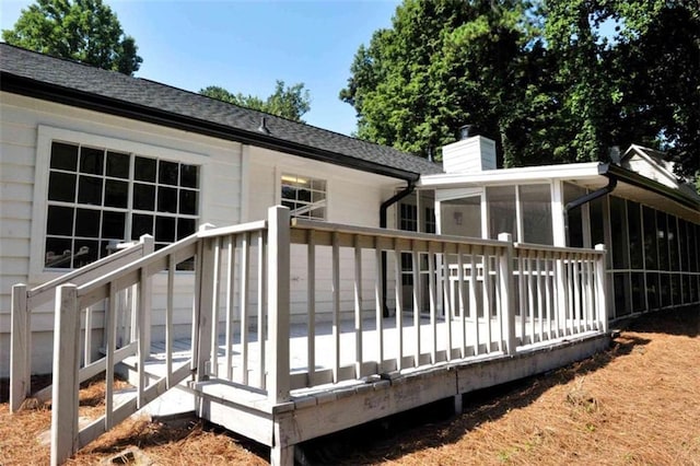 5974 SW Four Winds Dr SW, Lilburn, GA 30047 - wooden deck with a sunroom