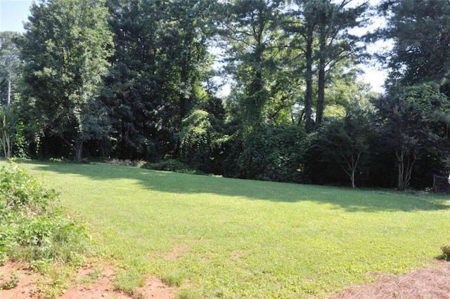 5974 SW Four Winds Dr SW, Lilburn, GA 30047 - view of green lawn