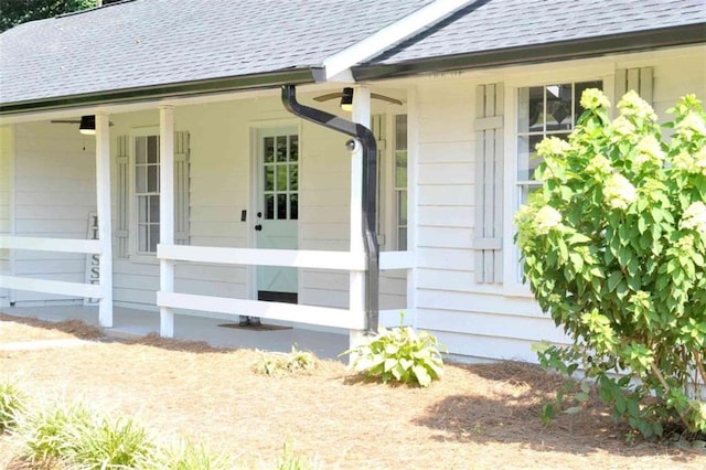 5974 SW Four Winds Dr SW, Lilburn, GA 30047 - view of side of home featuring roof with shingles and a porch