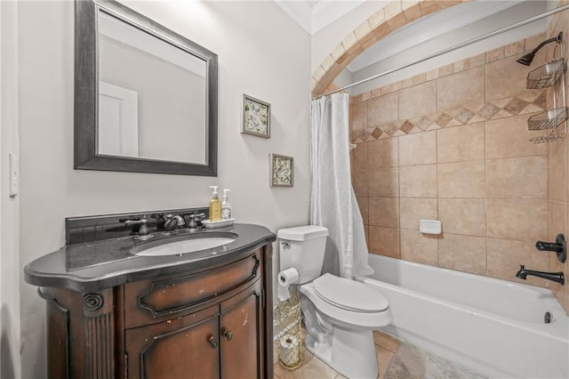 bathroom featuring tile patterned floors, toilet, shower / bath combo, and vanity