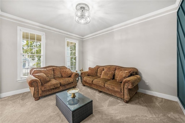 carpeted living room with baseboards, a chandelier, and ornamental molding