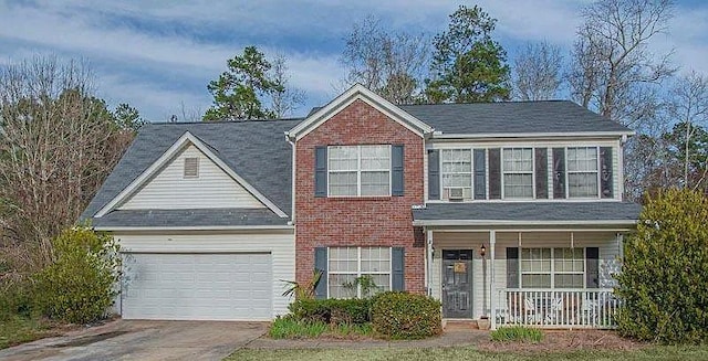 view of front of property featuring brick siding, a porch, concrete driveway, and an attached garage