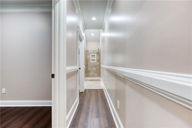 corridor with baseboards, dark wood-style flooring, and crown molding