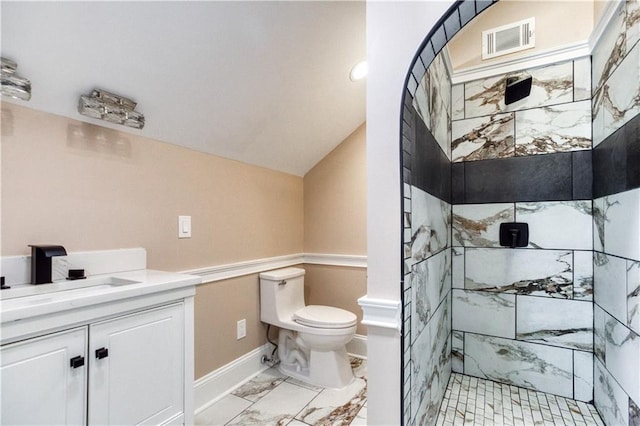 bathroom featuring toilet, vanity, visible vents, marble finish floor, and walk in shower