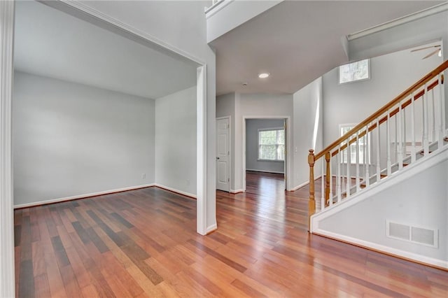 3805 Roxwood Park Dr, Buford, GA 30518 - entryway featuring wood finished floors, stairway, baseboards, and recessed lighting