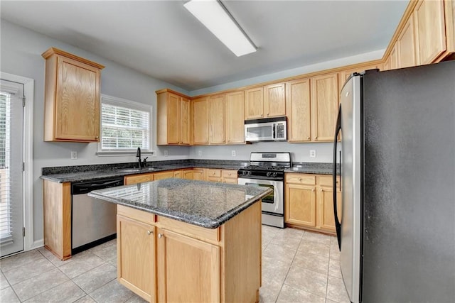 3805 Roxwood Park Dr, Buford, GA 30518 - kitchen with stainless steel appliances, light brown cabinets, and light tile patterned floors