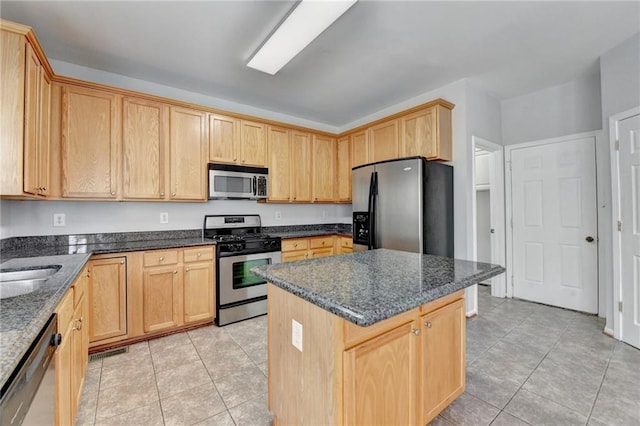3805 Roxwood Park Dr, Buford, GA 30518 - kitchen featuring appliances with stainless steel finishes, light brown cabinetry, and light tile patterned floors