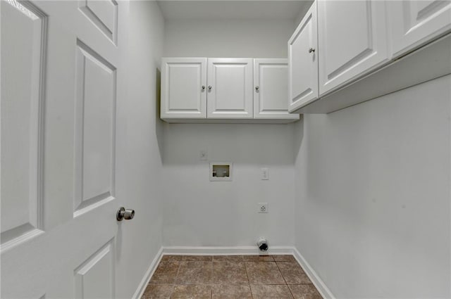 3805 Roxwood Park Dr, Buford, GA 30518 - laundry area with cabinet space, washer hookup, hookup for an electric dryer, baseboards, and dark tile patterned floors