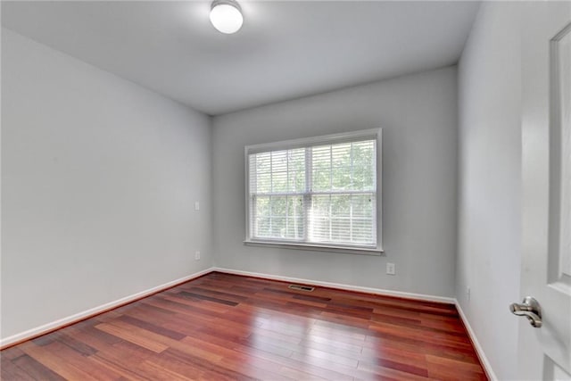3805 Roxwood Park Dr, Buford, GA 30518 - empty room featuring wood finished floors and baseboards