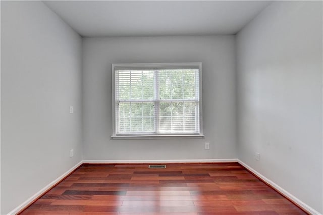 3805 Roxwood Park Dr, Buford, GA 30518 - empty room with wood finished floors and baseboards