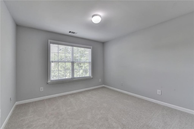 3805 Roxwood Park Dr, Buford, GA 30518 - carpeted spare room featuring baseboards