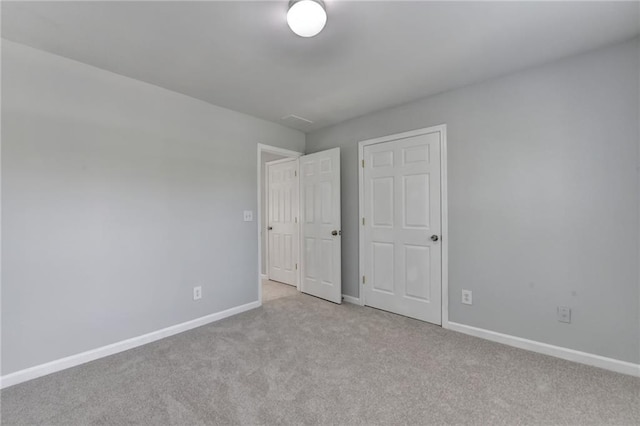 3805 Roxwood Park Dr, Buford, GA 30518 - unfurnished bedroom featuring carpet flooring and baseboards