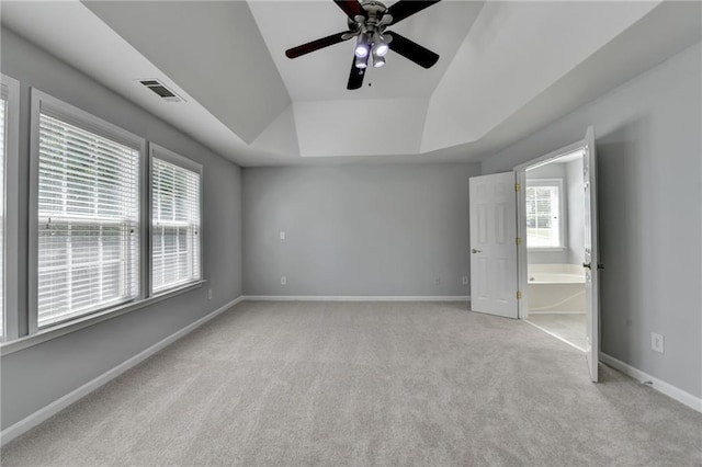 3805 Roxwood Park Dr, Buford, GA 30518 - unfurnished bedroom with light carpet, baseboards, and a raised ceiling